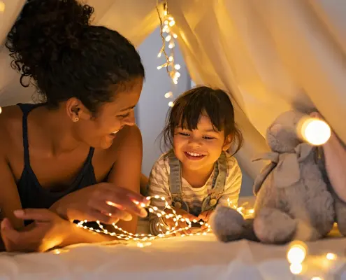 mother and daughter in tent