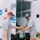 two HVAC service technicians responding to a service call