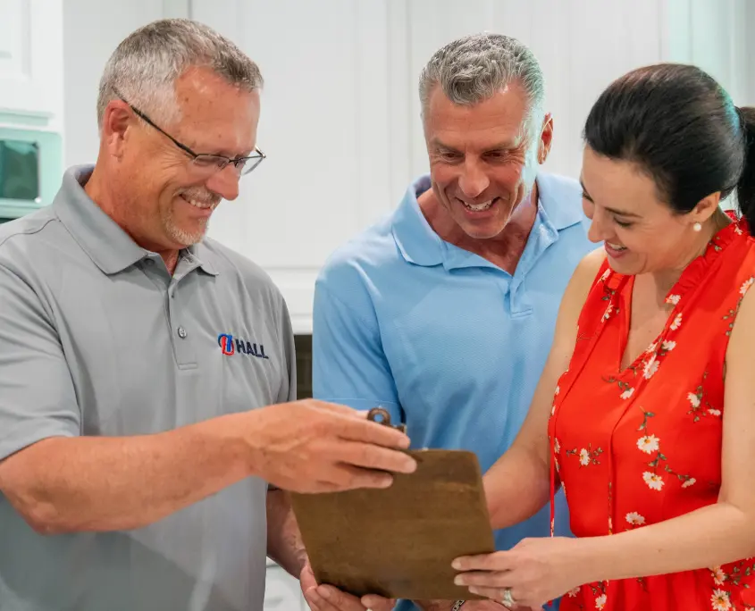 DSC04983 Hall technician helping customers make the switch to propane.