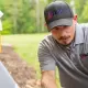 HVAC technician working on an outdoor unit