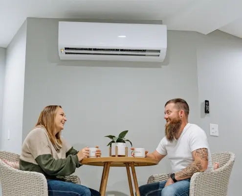 Mini-split in use with couple having coffee nearby