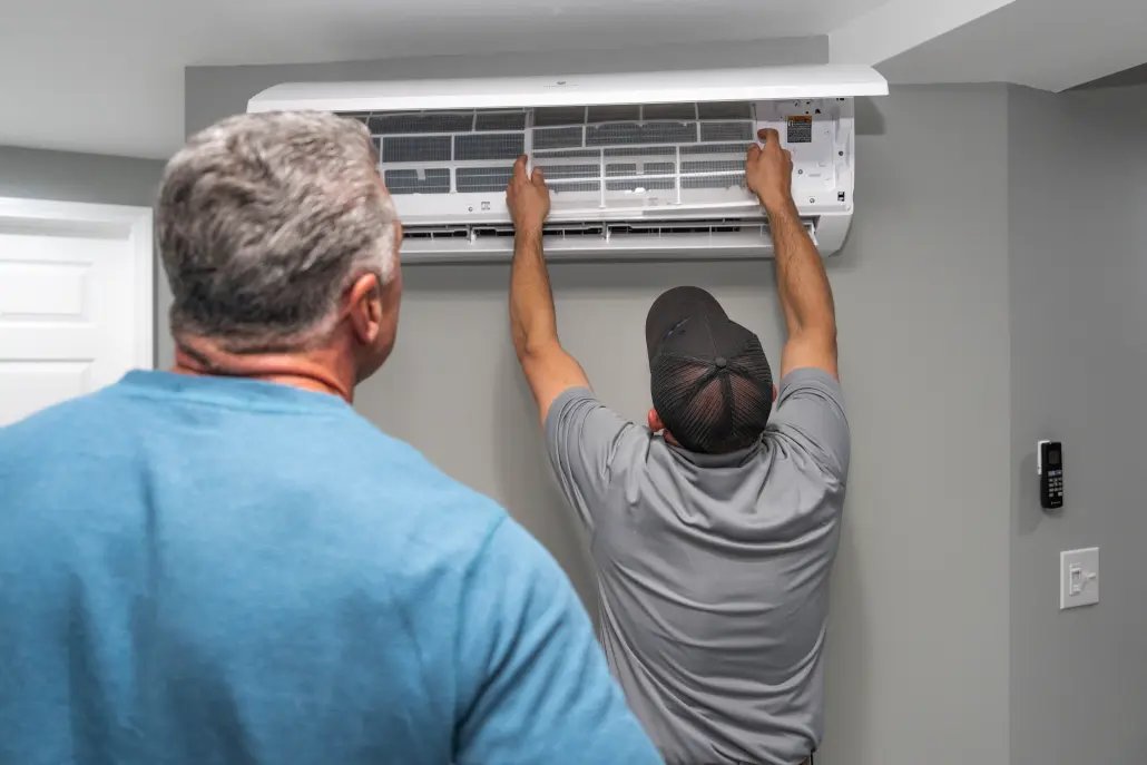 DSC04434 Hall HVAC removing a mini-split filter in a home